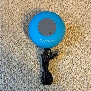 Aqua Blue Portable Bluetooth Speaker. Good for shower, suction.